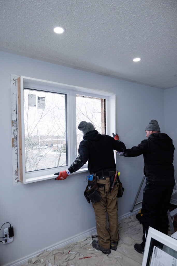 NTI Windows & Doors Installers Expertly Installing a New Energy-Efficient Window