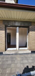 Exterior view of retrofit window replacement without removing brick or siding