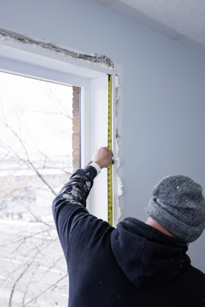 Winter window and door installation in progress in an Ontario home, showing proper staging and cold-weather installation practices.